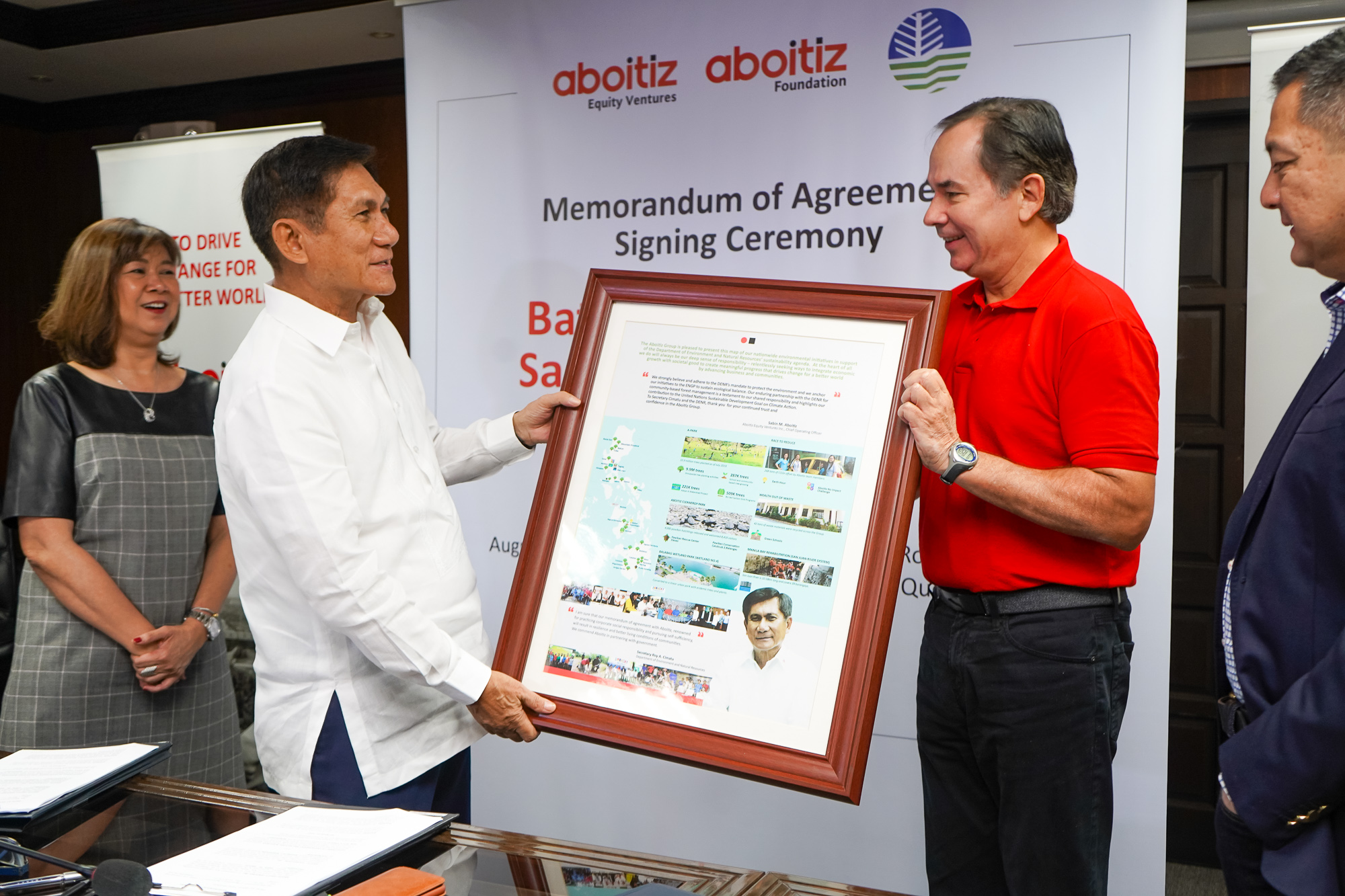 The Aboitiz Group presented Sec. Cimatu with a framed infographic of our groupwide environmental sustainability programs across the country.