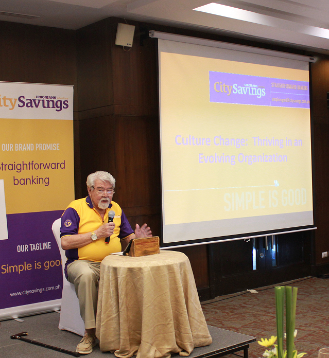 THRIVING IN AN EVOLVING ORGANIZATION: Member of the Board Romy Ronquillo speaks to the pool of CitySavings leaders on the importance of trust in an organization’s culture. 