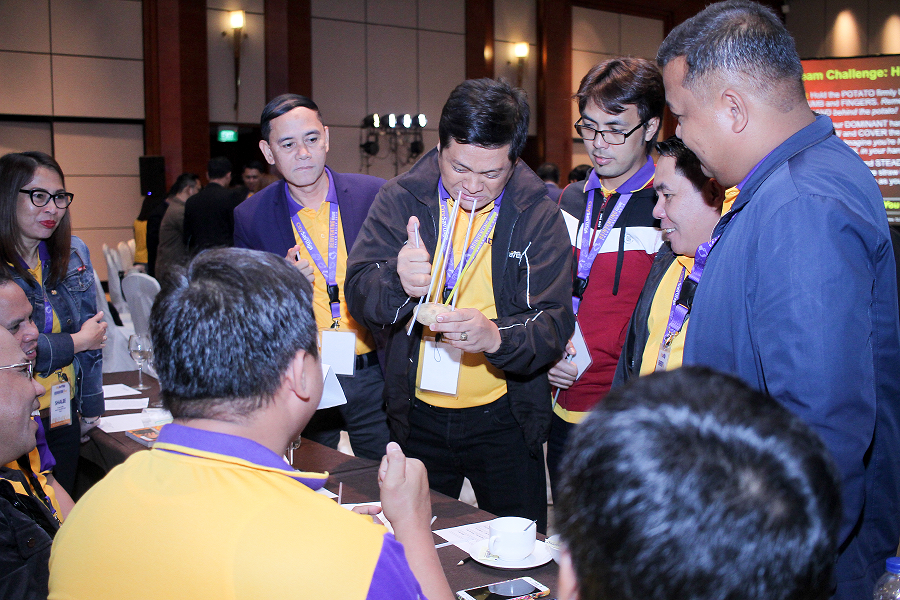 CHALLENGE ACCEPTED: Sales and Operations teams showcase tenacity and determination in overcoming the team challenge during the 2018 Sales Rally teambuilding activity last February 4 at Radisson Blu Hotel, Cebu City. 