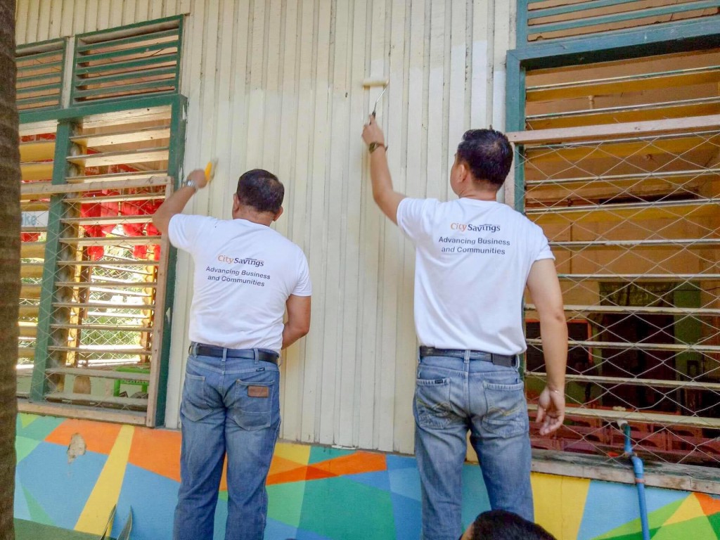 A FRESH START THIS JUNE: Employee volunteers from CitySavings Head Office helps repaint school facilities in time for the new school year.