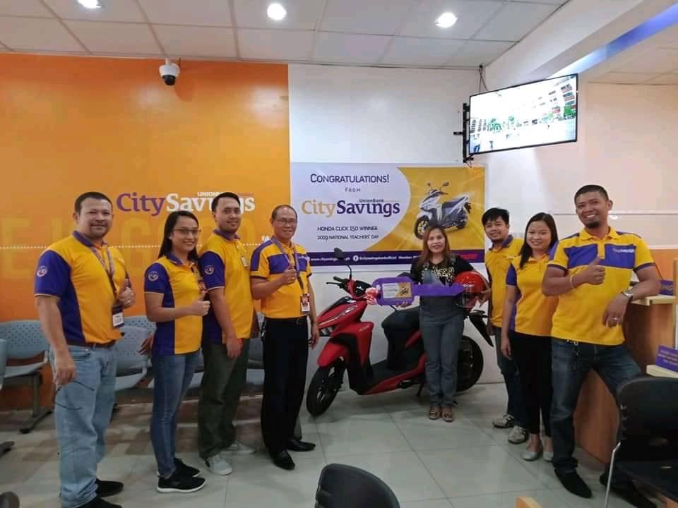 TEACHER TREATS: The winners of the brand new Honda Click Motorcycle happily receive their prizes. (L-R) Jocelyn Dela Torre Bacerra of Gaulan Elementary School in Zamboanga Sibugay, Charmyne Tumala of Tangub City Central School, and Odelio Ramoso of San Luis National High School, Gingoog City, Misamis Oriental.