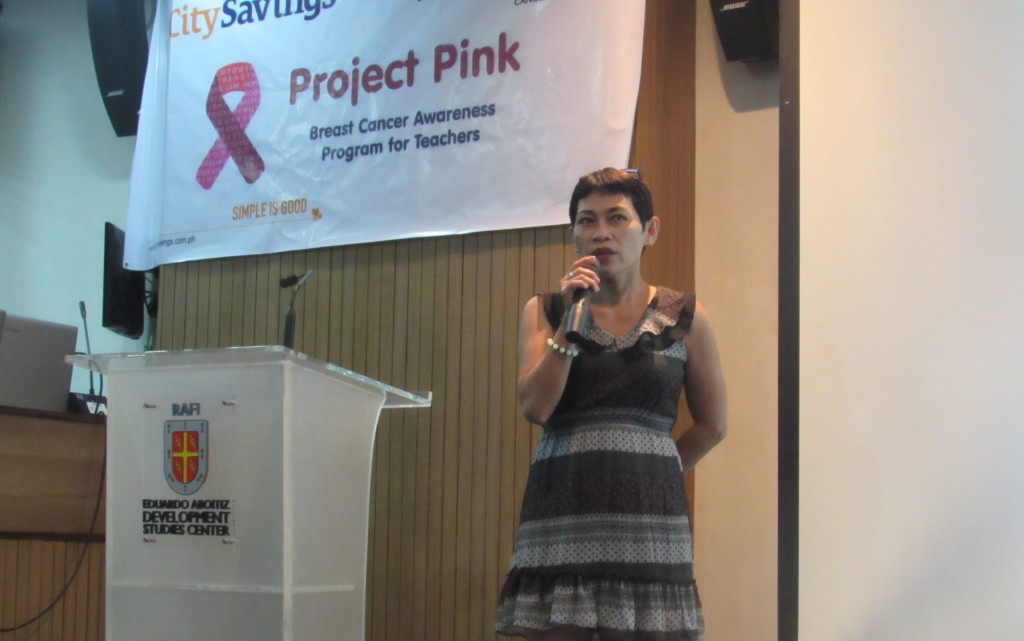 BREAST CANCER WARRIOR: Nora Moreno, guest speaker and a breast cancer survivor shares her testimonial on her triumph over breast cancer during the Project Pink forum last March 23 at EADSC, Cebu City.