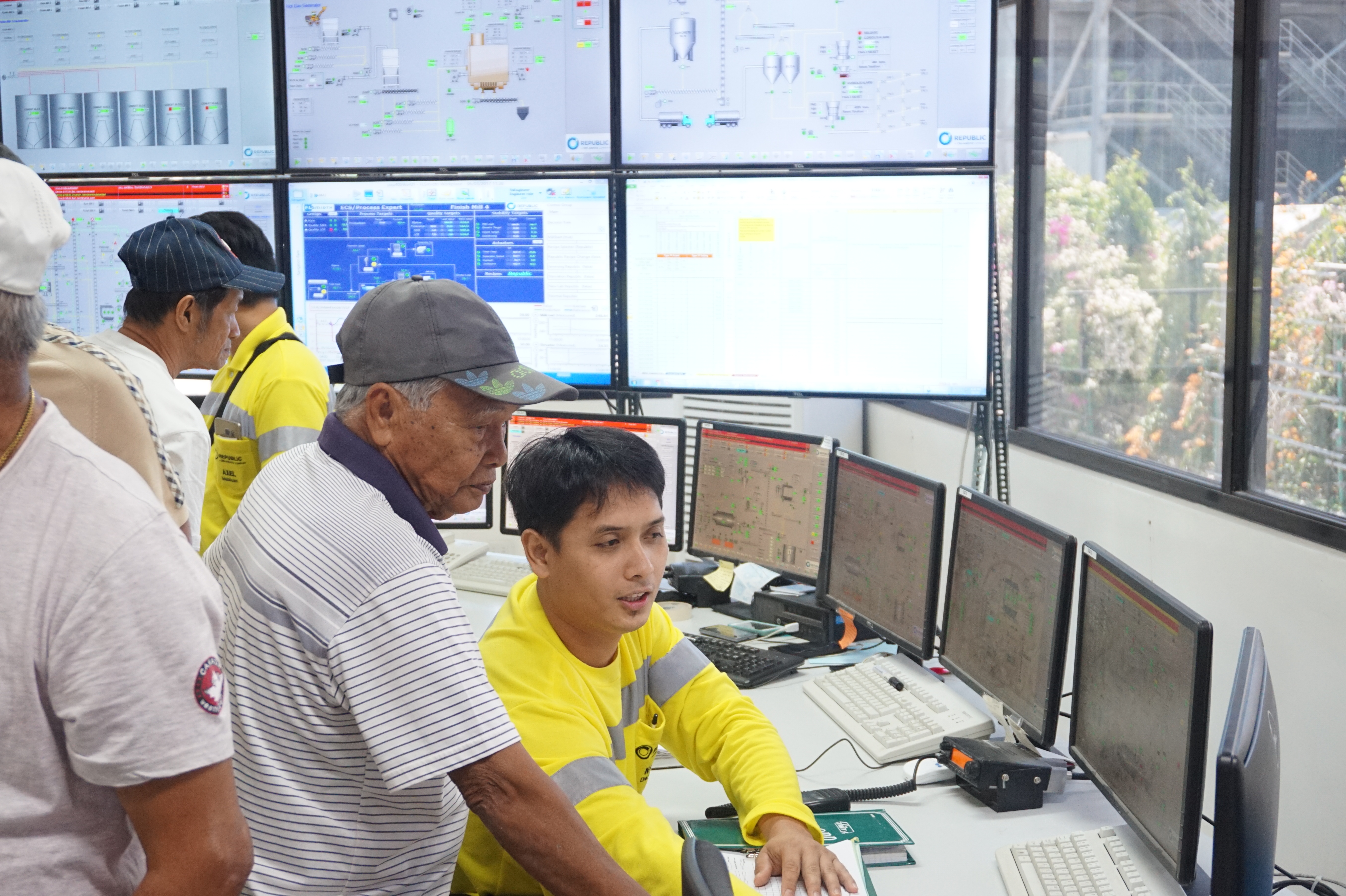 Now in their ‘80s, they gamely toured the plant and checked out the new control room where they exchanged notes with the young operators. 