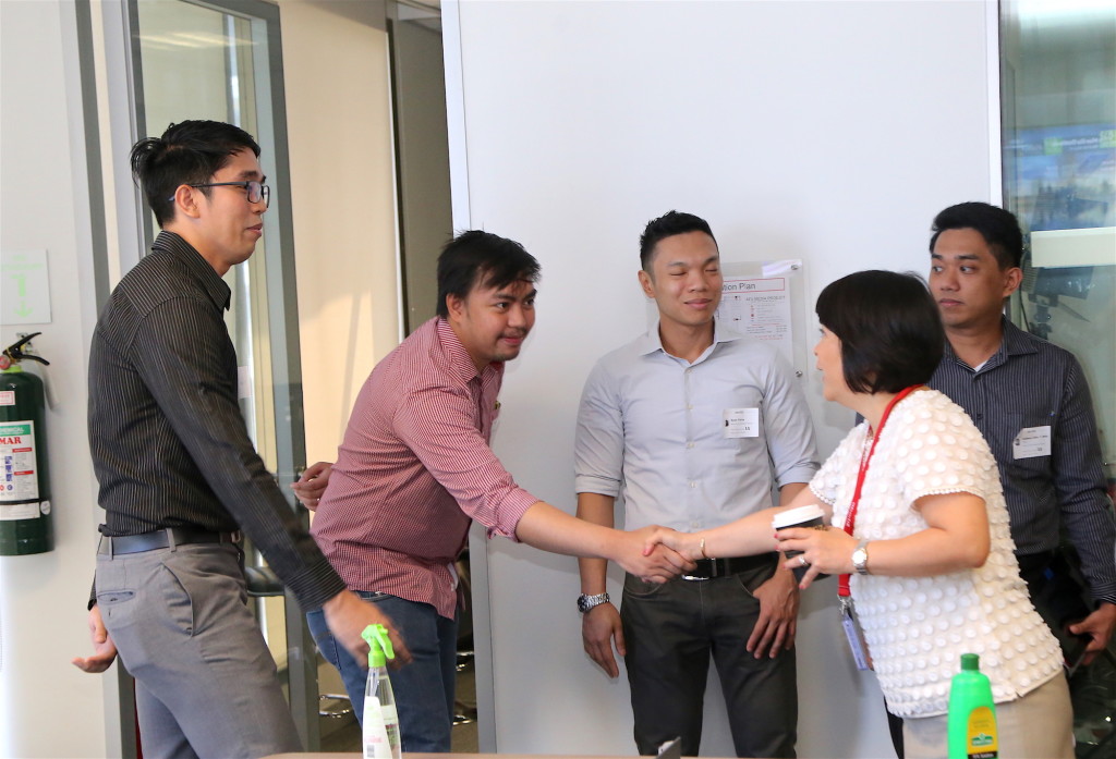 The team from Meralco meet with Aboitiz Foundation President Susan Valdez while visiting the a.Lab
