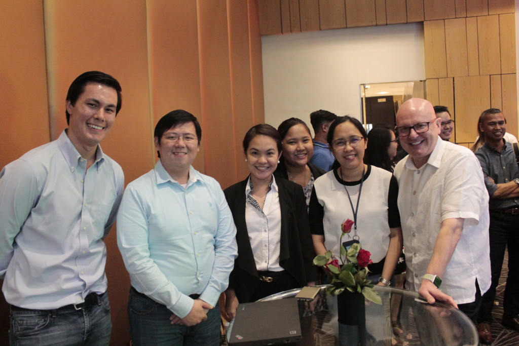 "Team Sam," the winner of the culminating event, snaps a picture with AEV Senior Vice President and Chief Strategy and Investment Officer Robert McGregor.