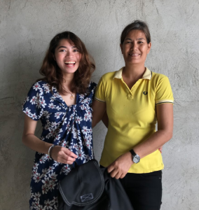 Miel and Riza take a photo holding one of SAMALA’s new products