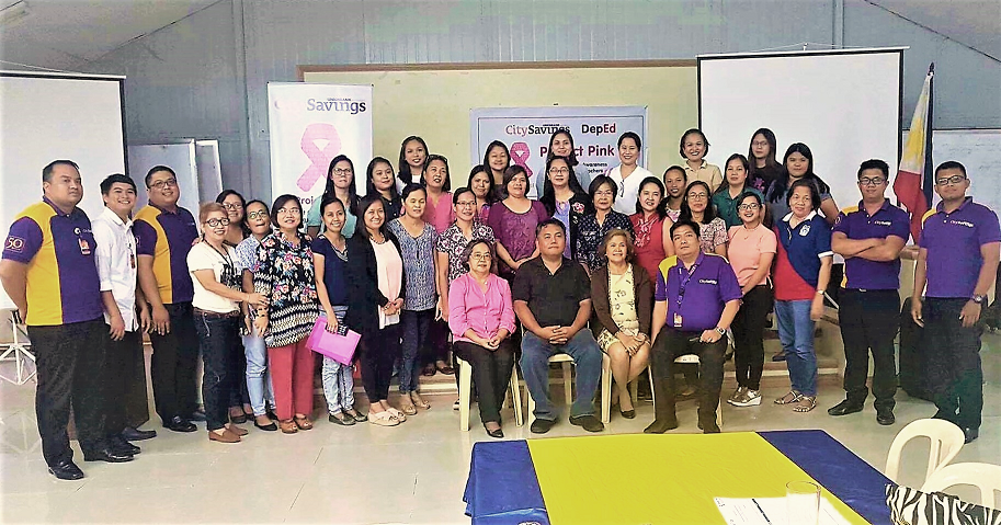 PROJECT PINK GOES TO LEGAZPI CITY: Educators and personnel from DepEd Region 5 with CitySavings Regional Business Head-Region 5 Arnulfo Santiago (seated 1st row, right most) together with guest speaker and breast cancer survivor Ma. Virgie Daguinsin (1st row, in pink) and CitySavings Legazpi branch team members during the first nationwide implementation of Project Pink forum at DepEd Regional Office, Legazpi City last October 27.