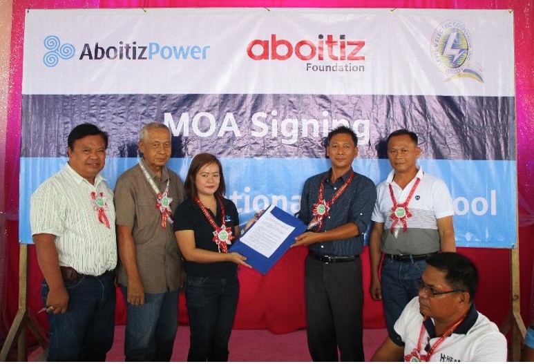 A WAY TO IMPROVE EDUCATION. AboitizPower, with support from Aboitiz Foundation, has committed to improving a school with LEYECO. From left: LEYECO V’s ISD Manager Max Torcende and Board Secretary Wilfredo Madjus, AboitizPower Account Officer Rhazel Formosa, Matag-ob National High School Principal Roland Aljibe, and DepEd Leyte’s representative Raul Salano.