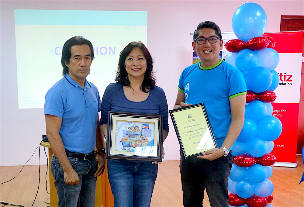 DepEd Batangas Division Supervisor David Nuay presents APRI with a special plaque signed by DepEd Sec. Leonor Briones to APRI VP-Corporate Services Officer Noemi Sebastian and Reputation Manager Apa Alviar.