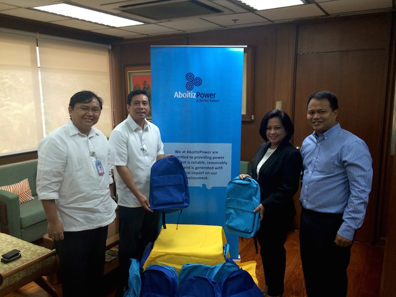 BAGS AND BASICS. TLI’s FVP for Corporate Services Charles Gamo and AEV’s AVP-Government Relations Atty. Martin Yasay visited the NPC office to personally deliver the blue AboitizPower backpacks, which are now part of the everyday learning activities of Barasoain Memorial Elementary School students.