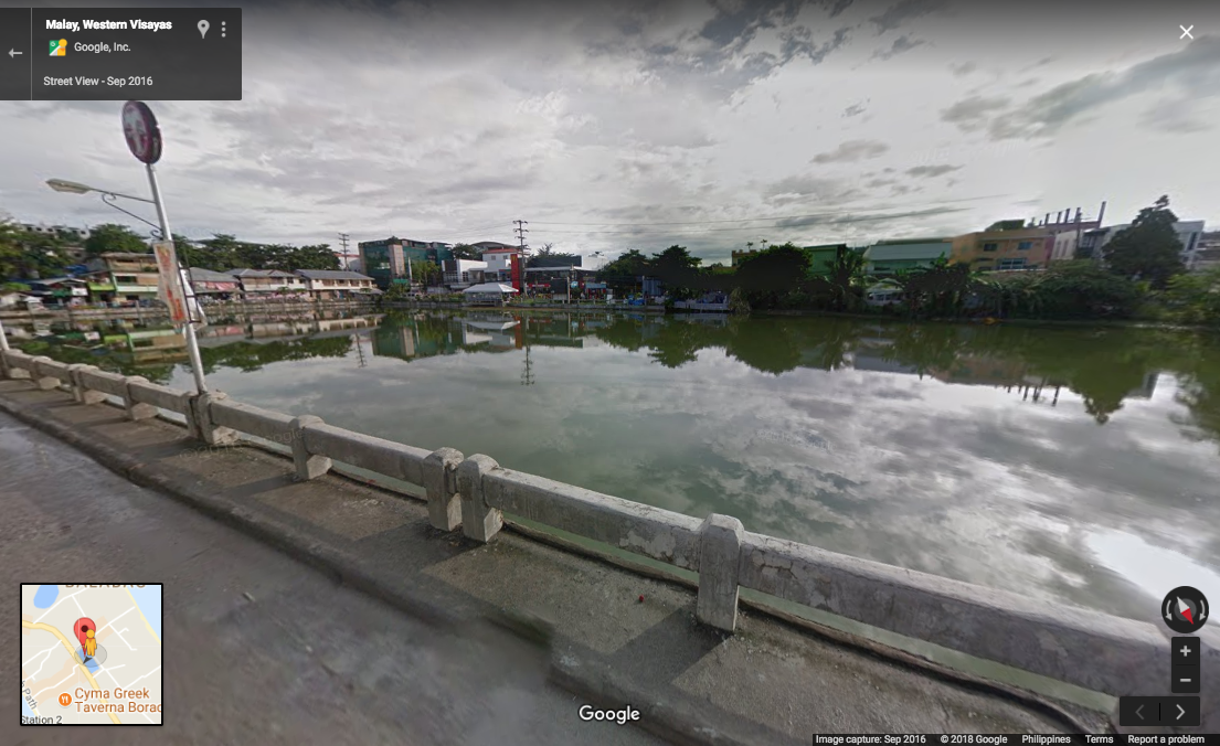 WETLAND NO. 4 NOW. Also known as "Balabag Lake", the wetland is fully surrounded by built structures. (Photo from Google Street View.)
