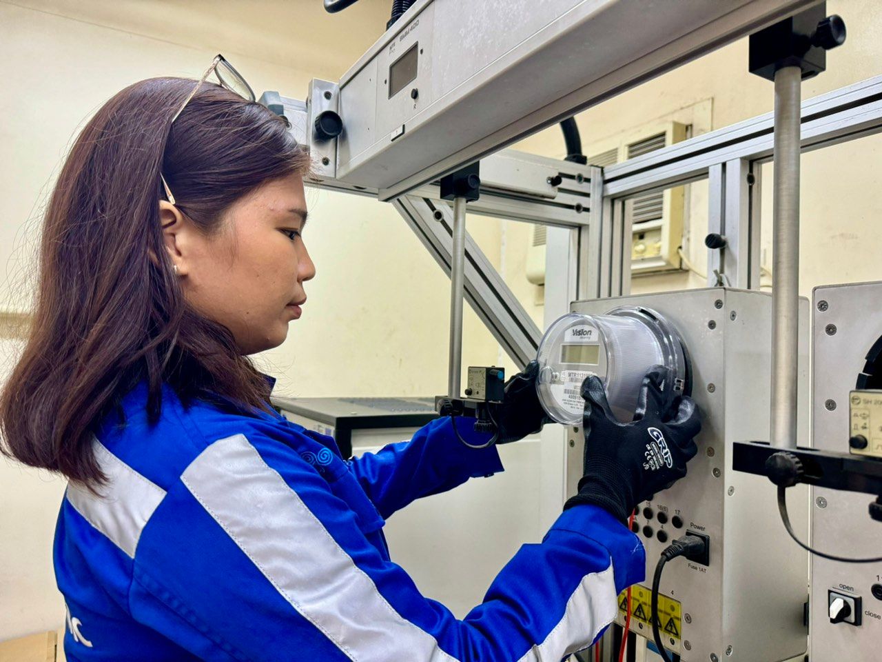 WOMEN CAN, TOO. Engr. Dianne inspects electrical meters, making sure they adhere to Visayan Electric Standards before getting dispatched to customers.
